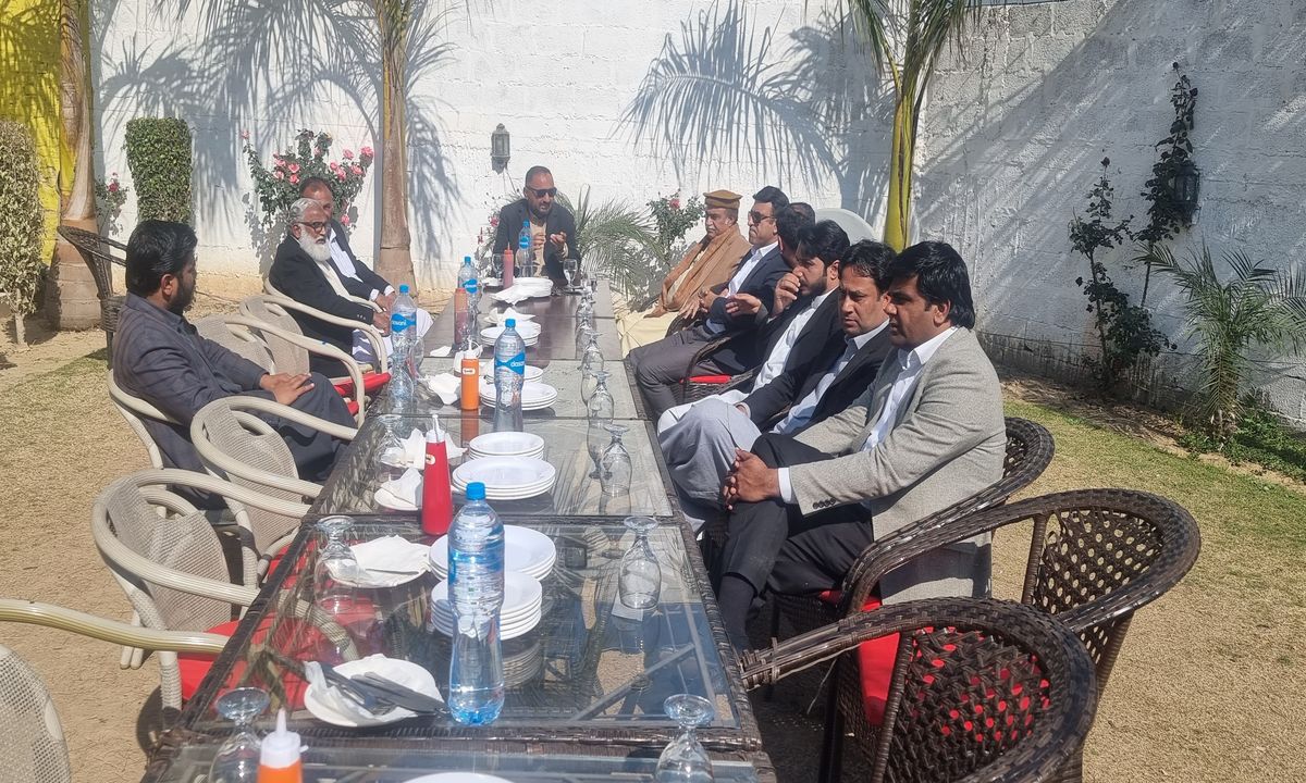 Charity Welfare Organization volunteers and community members meeting in Bhimber