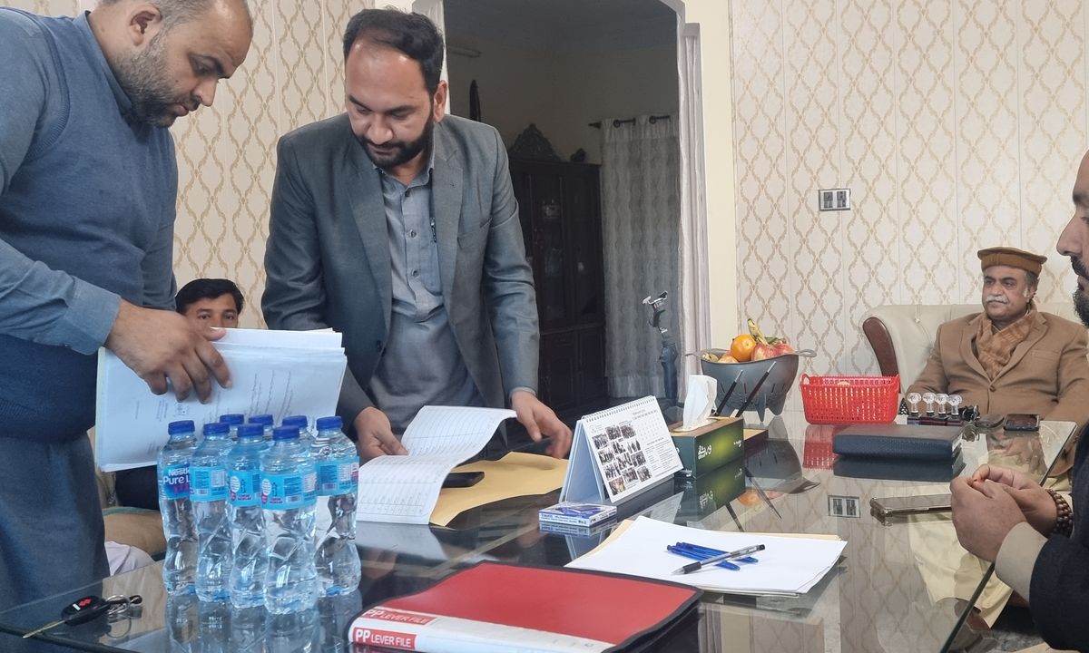 Case files being checked at the Charity Welfare Organization office in Bhimber